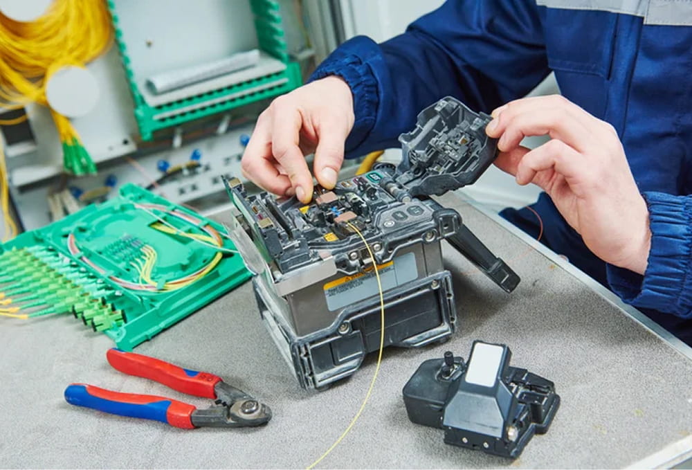 Someone working on fiber connections